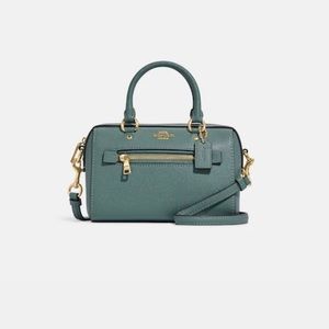 New with tags Marine colored Mini Coach Rowan Satchel
